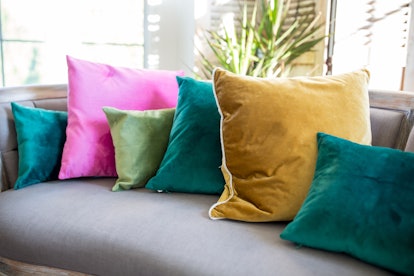 bright pillows and statement pieces are a home decor 2023 trend.